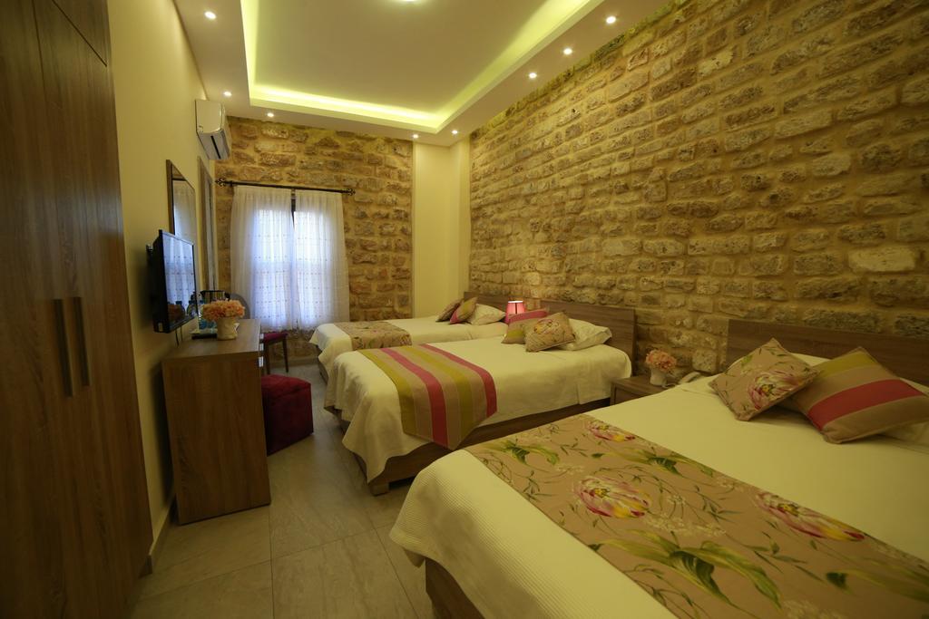 Asamina Boutique Hotel Tiro Exterior foto